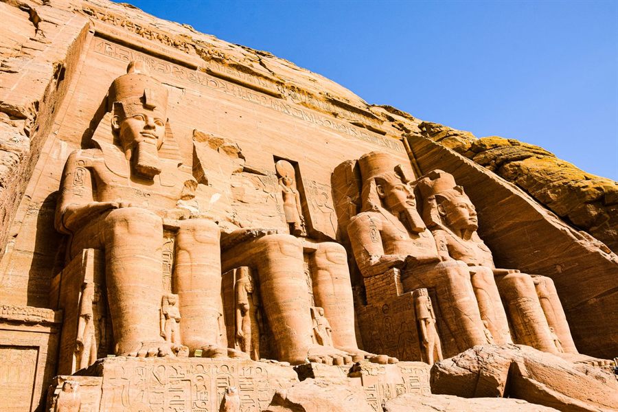 The colossal seated statues of Ramses II at Abu Simbel